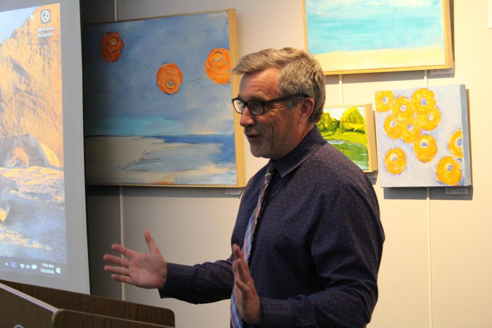 Library Director Patrick Marshall gives a closing statement that's one for the books. Photos by Brandy Muz