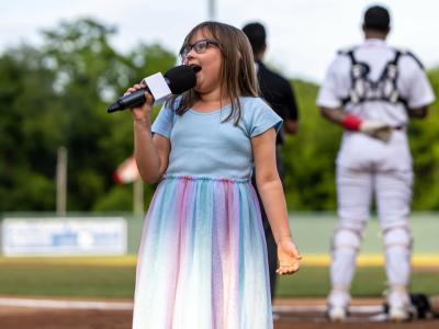 The pipsqueak with the pipes at a baseball game last summer.